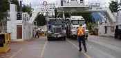 trucks loading within an inch of the back of my bike.