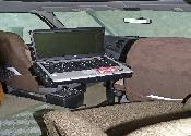 Using Laptop in Chair of Motorhome