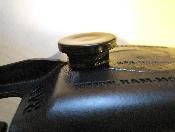Close up of button attached to cradle