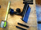 Finished assembly with spare brackets for other model tablets